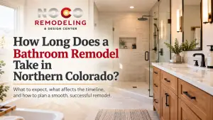 Modern bathroom remodel with walk-in glass shower and wood vanity, featuring NOCO Remodeling & Design Center&rsquo;s Northern Colorado bathroom remodeling timeline guide.